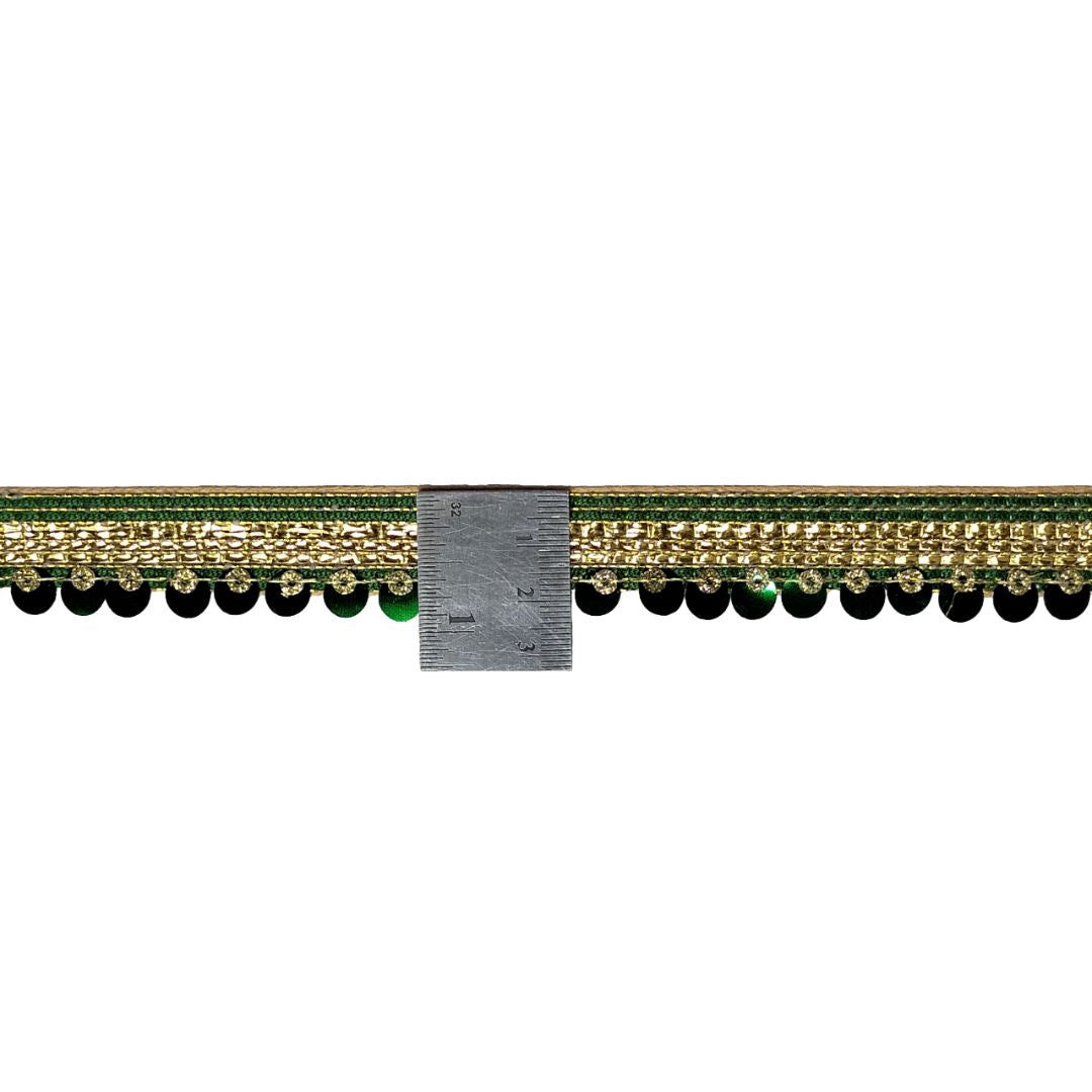 Decorative trim with gold and black beads on a white background